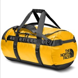 the north face yellow duffel bag